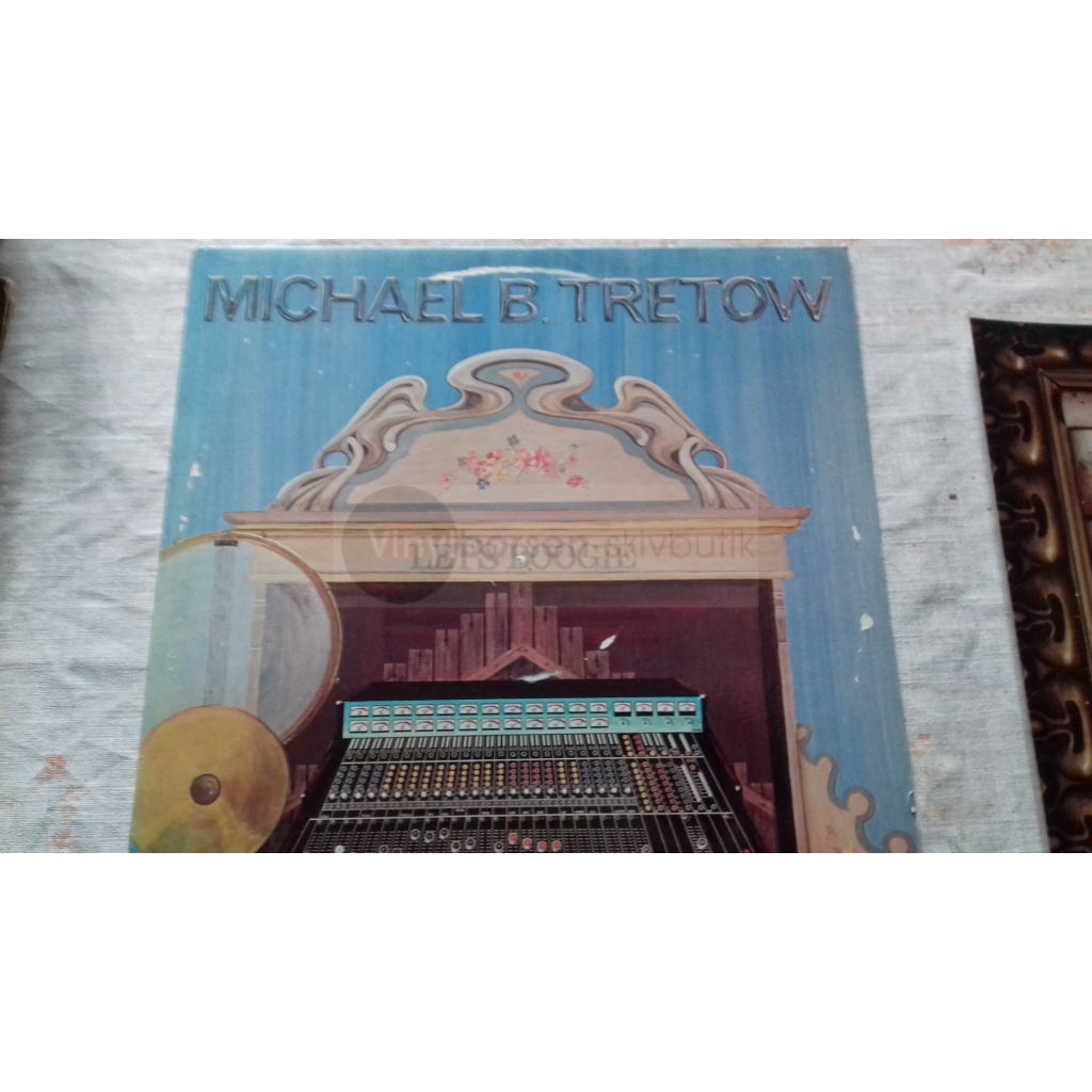 MICHAEL B. TRETOW     