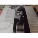 BUCK OWENS BRIDGE OVER TROUBLED WATER