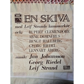 EN SKIVA MED...