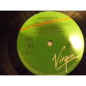 STEVE WINWOOD  ROLL WITH IT