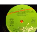 T`PAU 