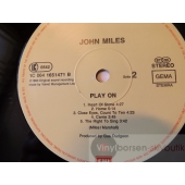 JOHN MILES  