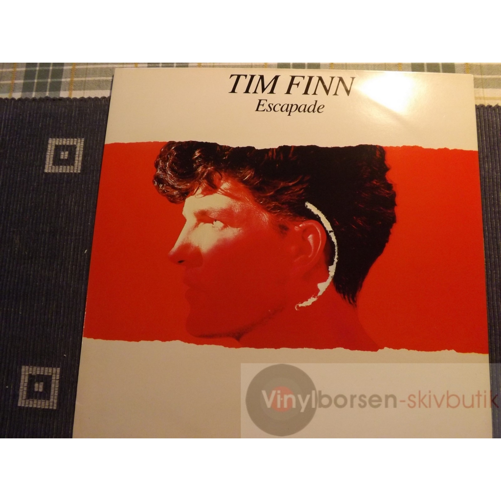 TIM FINN  